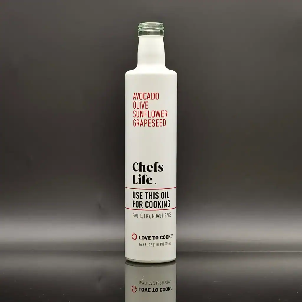 High-precision screen printing on glass bottles for food-grade oil packaging, featuring crisp text and professional branding.